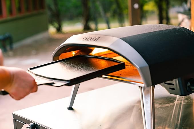 ooni Cast Iron Dual-Sided Grizzler Plate - 13.6" x 12.5" Reversible Griddle with Removable Handle and Stainless Steel Trivet, Pre-Seasoned Non-Stick Oven Safe Cookware, Pizza Oven and BBQ Accessories