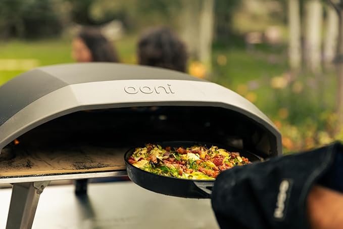 ooni Cast Iron Skillet Pan - 9" Round Fyring Skillet Pan with Removable Handle and Sainless Steel Trivet, Cast Iron Frying Pan, Pre-Seasoned Non-Stick Oven Safe Cookware, Pizza Oven & BBQ Accessories