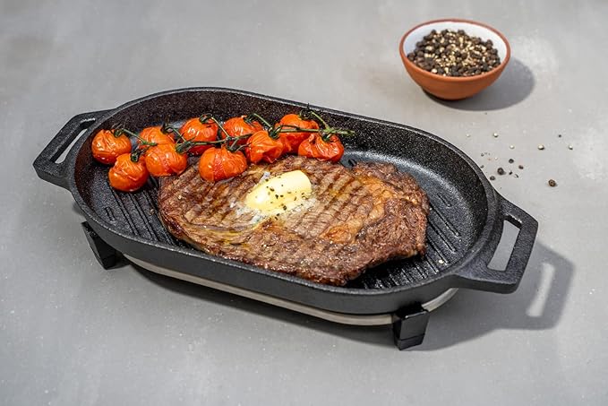 ooni Cast Iron Grizzler Pan - Grill Frying Pan, 12" x 6" Griddle Plate with Removable Handle and Stainless Steel Trivet, Pre-Seasoned Non-Stick Oven Safe Cookware, Pizza Oven and BBQ Accessories