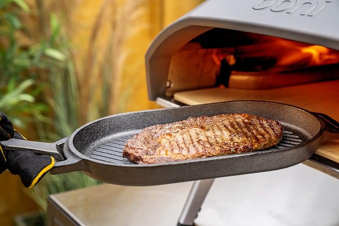 ooni Cast Iron Grizzler Pan - Grill Frying Pan, 12" x 6" Griddle Plate with Removable Handle and Stainless Steel Trivet, Pre-Seasoned Non-Stick Oven Safe Cookware, Pizza Oven and BBQ Accessories