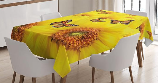 Ambesonne Sunflower Tablecloth, Sunflower Flowers Butterfly Warm Colors Round Close up Details Fun Design, Rectangular Table Cover for Dining Room Kitchen Decor, 60" X 90", Marigold Yellow