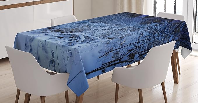 Ambesonne Christmas Tablecloth, Snowy Forest at Night with Xmas Star Holiday Blizzard Winter Sky Universe, Rectangular Table Cover for Dining Room Kitchen Decor, 60" X 90", Navy Blue