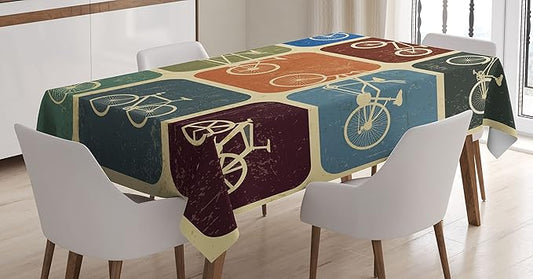 Ambesonne Vintage Tablecloth, Retro Image Collage of Bicycle Bikes in a Row with Abstract Pattern Colored Art, Rectangular Table Cover for Dining Room Kitchen Decor, 60" X 90", Soft Beige